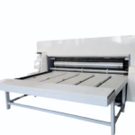 Corrugated board & box making machines & Spares.