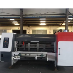 Corrugated board & box making machines & Spares.